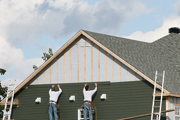 Professional Vinyl Siding technician working in Cherry Tree, PA